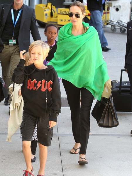 Brad Pitt,  Angelina Jolie  and kids arriving at the Los Angeles International Airport